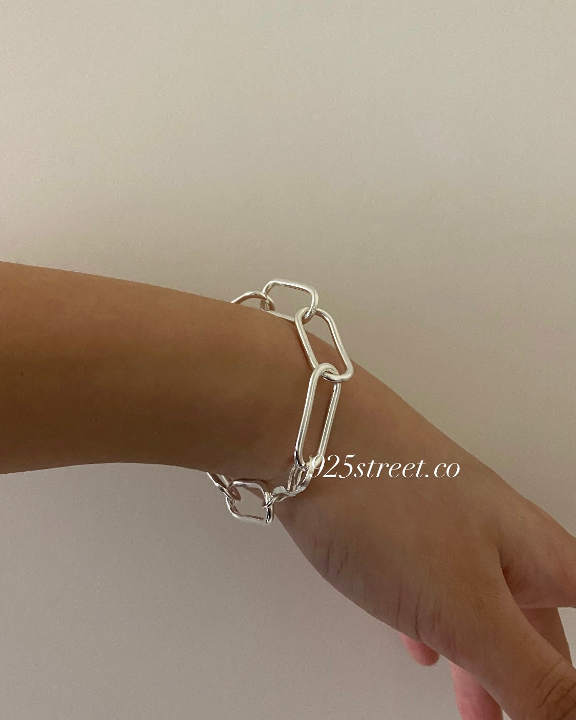 Stackable sterling silver statement bracelet with flat elongated links